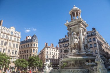 LYON, FRANCE - JULY 13, 2019: Place des Jacobins Square in Lyon with its iconic fountain. It is one of the main landmarks of the Old Lyon in the Presqu'Ile district clipart