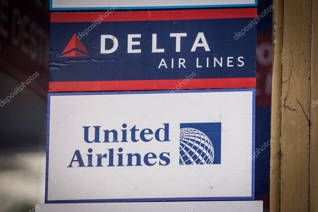 BELGRADE, SERBIA - MAY 9, 2020: Delta and united airlines logos on their local retailer for Serbia. Delta and United are two major american airline companies, the flag carriers of the USA