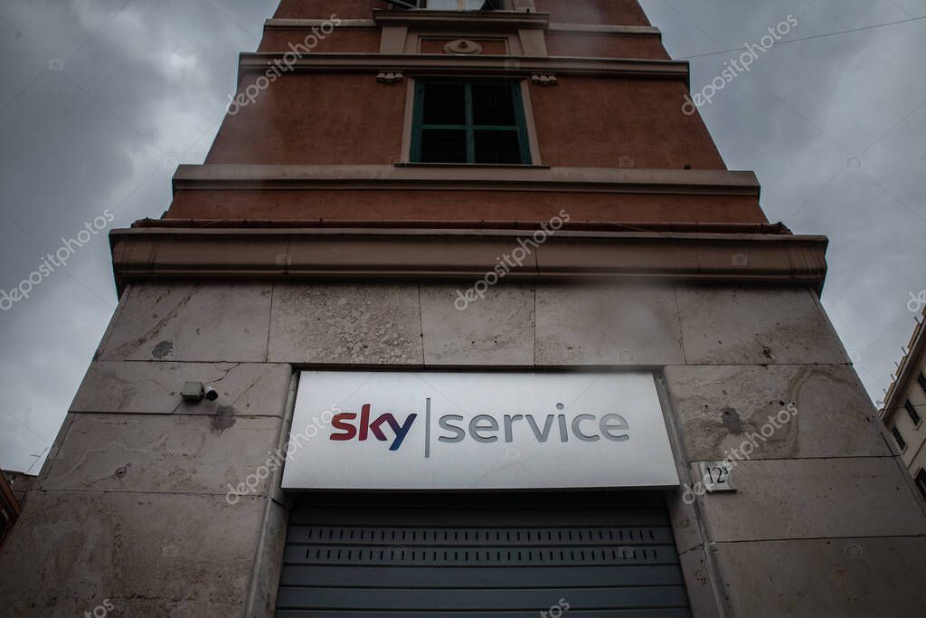 ROME, ITALY - JANUARY 15, 2025: Low-angle view of a closed Sky Service office in central Rome shows the Sky Italia logo. sky Italia, part of Comcast, is an Italian satellite television platform.