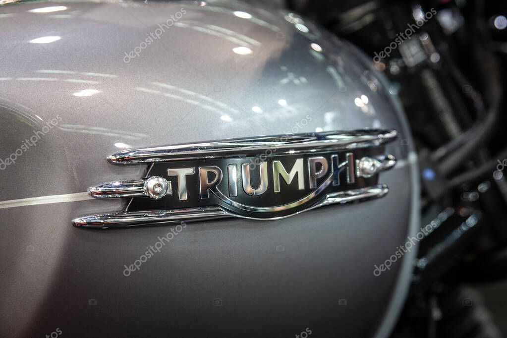 BELGRADE, SERBIA - MARCH 15, 2025: Logo of Triumph on a motorcycle in Belgrade. Triumph Motorcycle is a motorbike manufacturer from Great Britain.