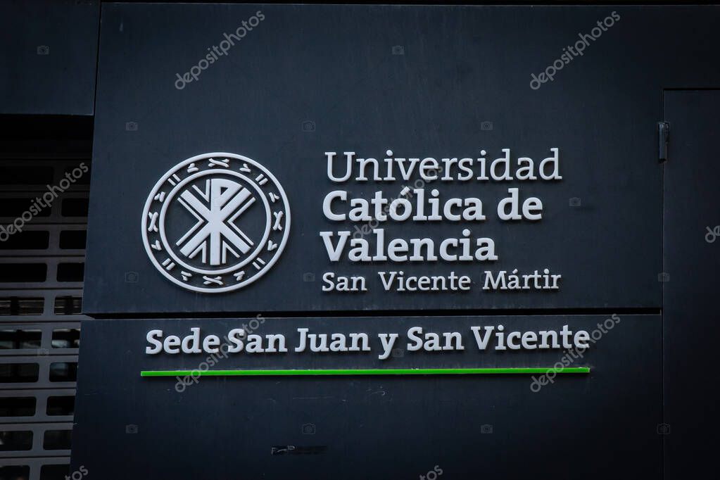 VALENCIA, SPAIN - APRIL 6, 2025: A sign for the Catholic University of Valencia (Universidad Catlica de Valencia) is displayed on the university's building. It's a private catholic university