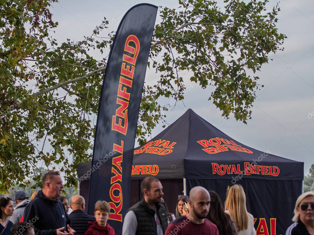 BELGRADE, SERBIA - SEPTEMBER 24, 2022: Logo Royal Enfield on a promotional tentat a dealership in Belgrade, Serbia, Royal Enfield is an indian motorcycle manufacturer.