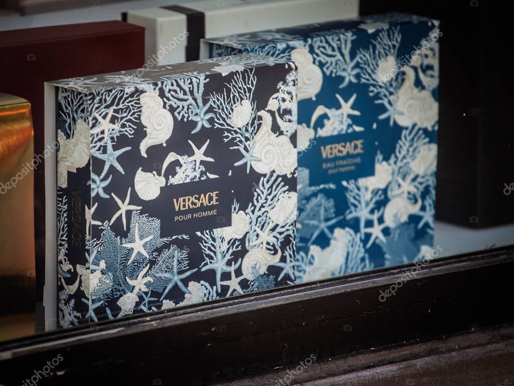 BELGRADE, SERBIA - JUNE 1, 2025: Close view of boxed Versace Pour Homme fragrances in a shop window, Versace is an italian fragrance, fashion and cosmetics brand.