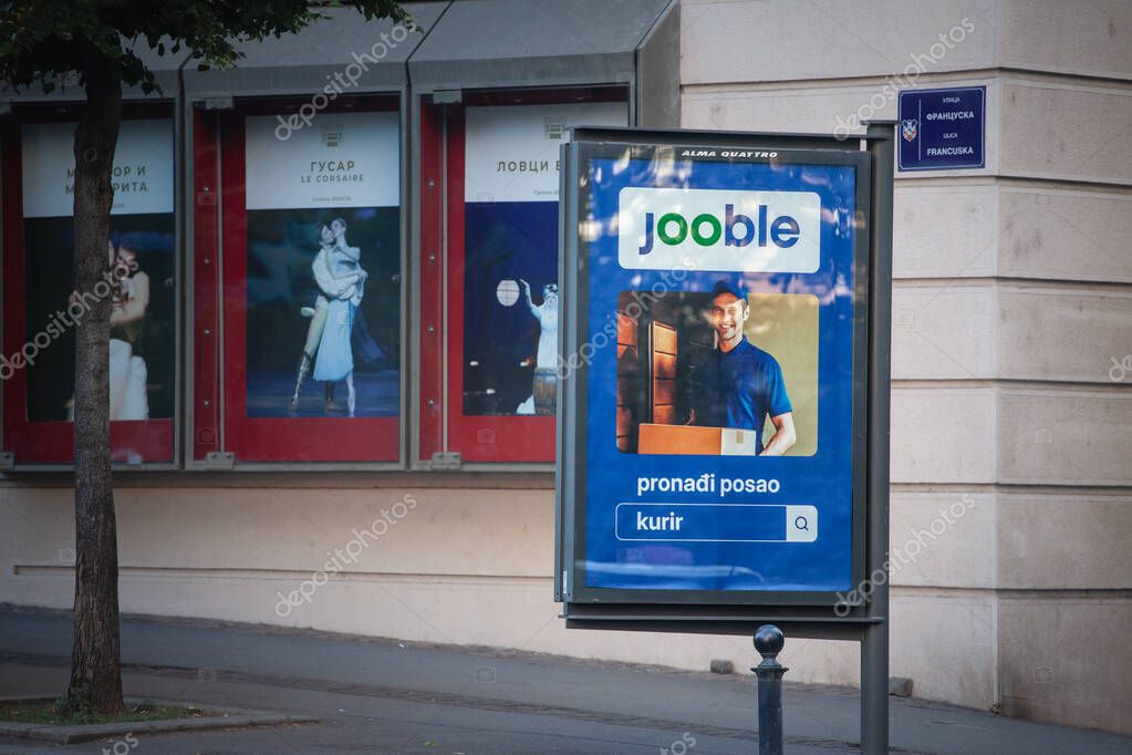 BELGRADE, SERBIA - AUGUST 10, 2025: Street ad in Belgrade for the Jooble website promoting the job search website's services.