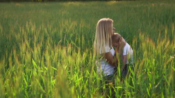 Spring portrait of mother and son on Mothers Day. — Stock Video