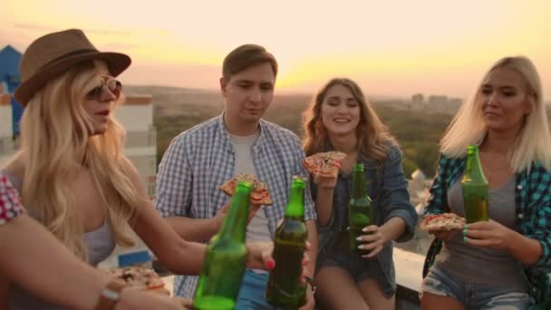 Young company is enjoying beer on the roof — Stock Video