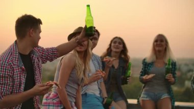 Boy raises a toast to friends birthday