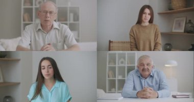 Çeşitli insanlar web kameralarına bakar. Webinar konferansına katılırlar. Erkek lider, koç, akıl hocası sanal görüntülü konuşma sırasında konuşurlar. Ekran görünümü