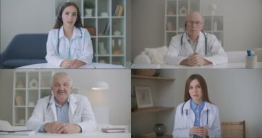 Sosyal mesafeli doktor internet üzerinden iş yeriyle bir video konferansı düzenliyor. Bir grup doktor canlı yayında sohbet uygulaması üzerinden dirsek darbesiyle selamlaşıyor.