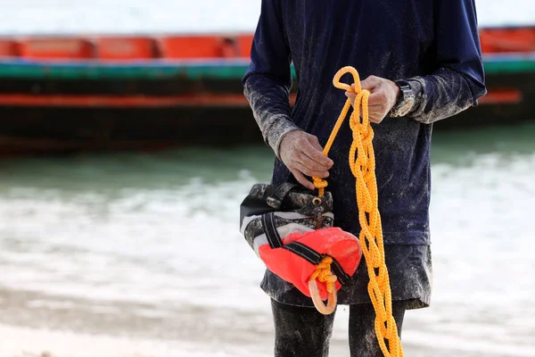 Rescue training  to help the victims with a rope on the beach for lifeguard  and first aid in Thailand.CPR and AED Automated External Defibrillator