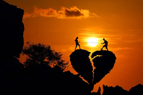 Couple Broken Heart Shape Rock Mountain Red Sky Sunset Silhouette — Stock Photo, Image