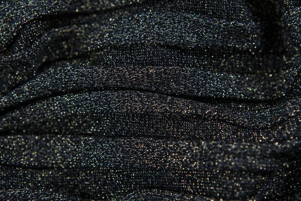 Parte textil de punto en colores negro y dorado —  Fotos de Stock