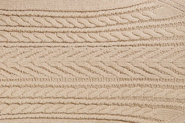 Tessuto lavorato a maglia da primo piano di colore beige — Foto Stock