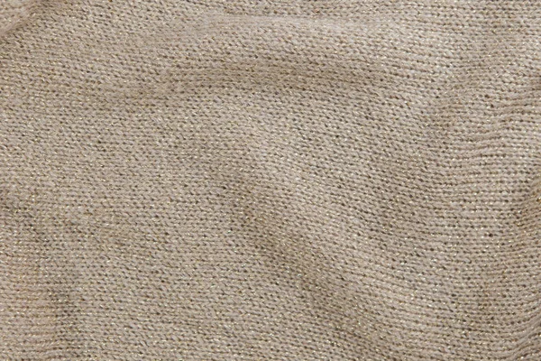 Pletené textilní detail v barvách béžové a zlaté — Stock fotografie