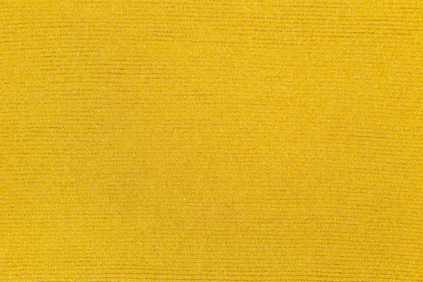 Goldene und gelbe Farbe Baumwollgestricktes Textil als Hintergrund — Stockfoto