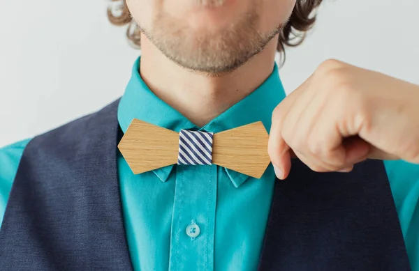 Young man with beard in a wooden bowtie — 스톡 사진