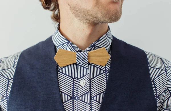Man with beard in a wooden bowtie — Stock Photo, Image