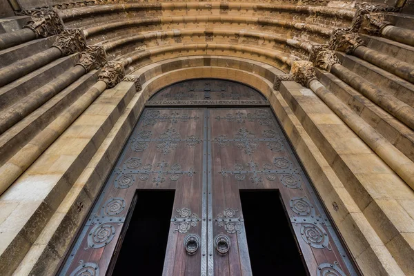 Beautiful Lisbon cathedral doorway closeup. Forged patterns.