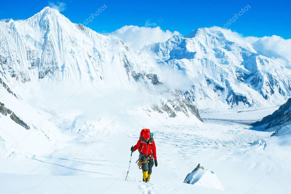 Climber  reaches the summit of Everest. Mountain peak Everest. Highest mountain in the world. National Park, Nepal