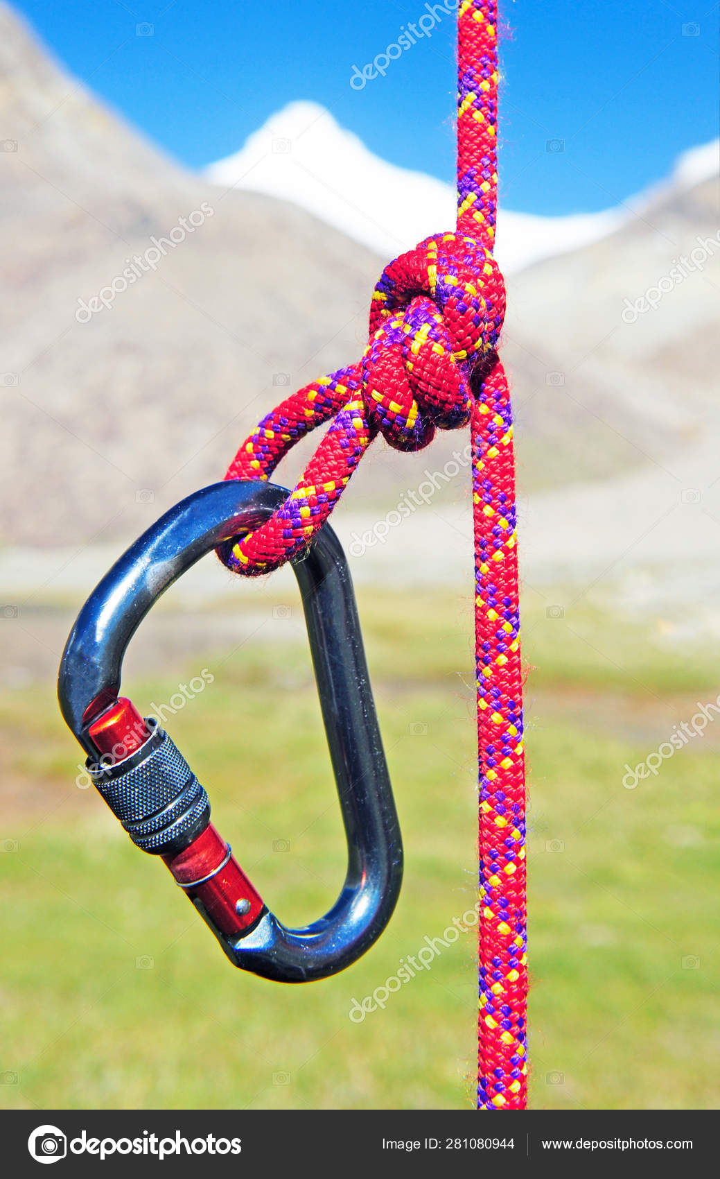 Climbing equipment - carabiner and rope Stock Photo by ©AndriiVergeles  281080944