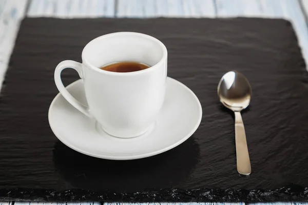 stock image cup of coffee and teaspoon