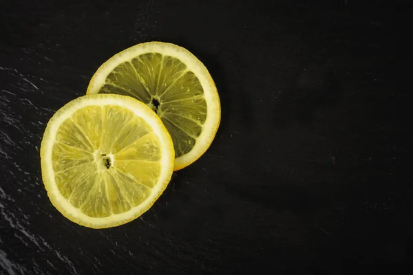 two fresh lemon slices