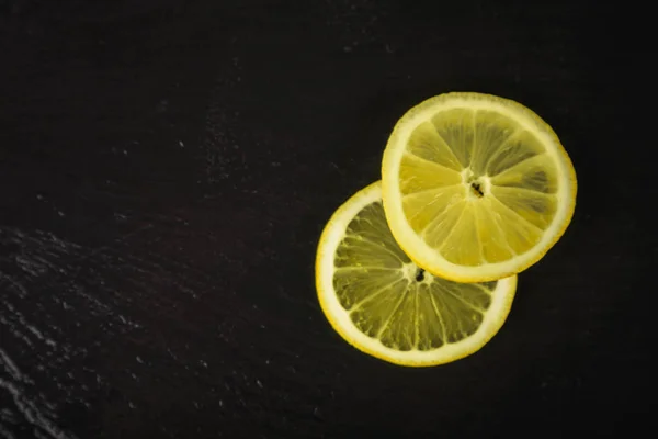 two fresh lemon slices