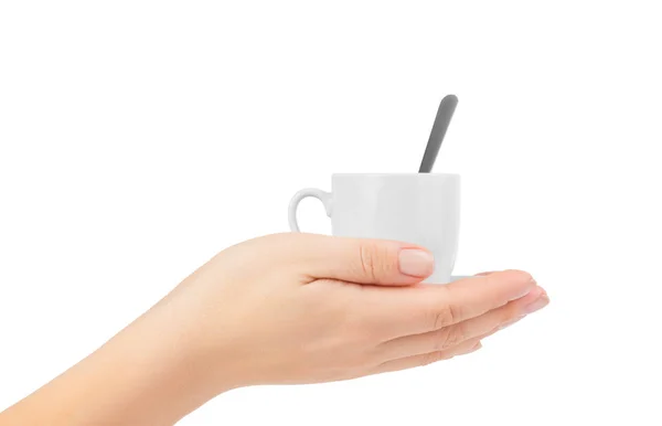 Mão segurando xícara branca de café — Fotografia de Stock