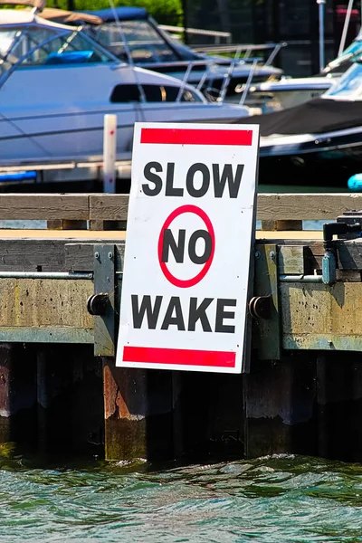 Slow Wake Sign Dock Boats Background — Stock Photo, Image