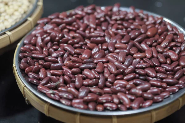 red bean seeds. The texture of the legumes. Close up red beans b