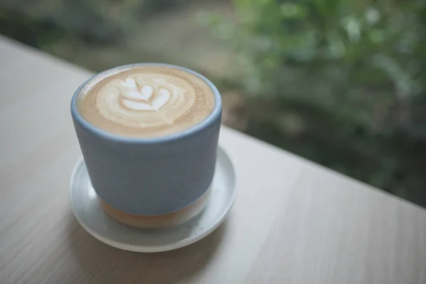 Hot cappuccino coffee cup with tree shape latte art milk foam on — Stock Photo, Image