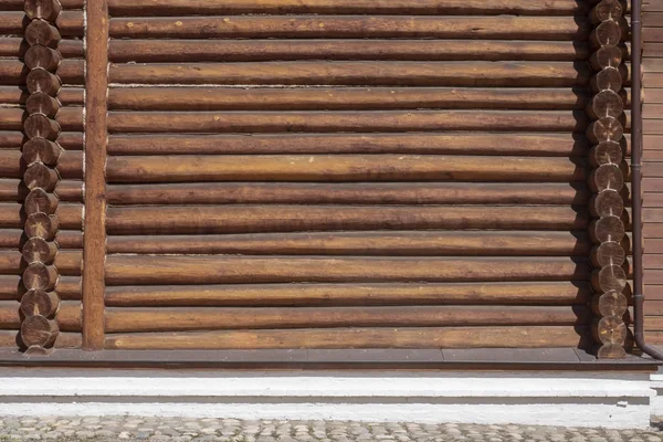 Background, wall of a wooden house made of logs. — Stock Photo, Image