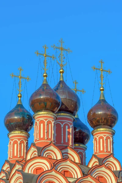 Ancient domes of the Orthodox Russian Church with crosses. Church of St. Nicholas in Moscow.