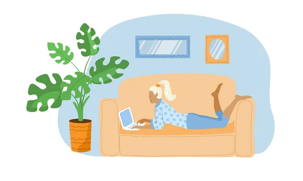 Blonde girl in pajamas is lying on sofa with a laptop. A young self employed freelancer woman works at home or browses pages of social networks. Stock vector illustration isolated on white background. — Stock Illustration Blonde Girl Pajamas Lying Sofa Laptop Young Self Employed Freelancer Stock Vector