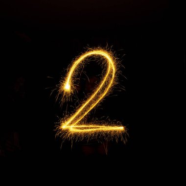 Sayı 0'dan 9 siyah bir maytap kullanılarak oluşturulan