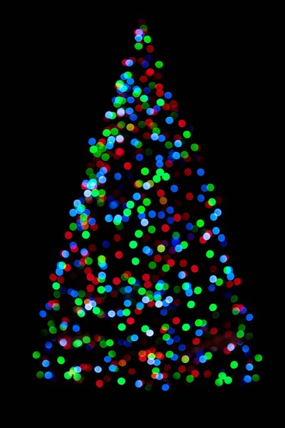 Luces borrosas del árbol de Navidad aisladas sobre fondo negro — Foto de Stock