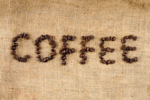 構造化された背景の形成という言葉は コーヒー コーヒー豆 — ストック写真