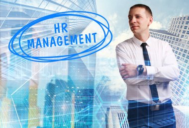 İş, teknoloji, Internet ve ağ kavramı. Genç işadamı gösteren Yazıt: İK yönetimi