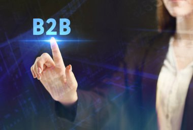 İş, teknoloji, Internet ve ağ kavramı. Geleceğin sanal bir ekranda çalışan genç bir girişimci ve yazıt görürse: B2b