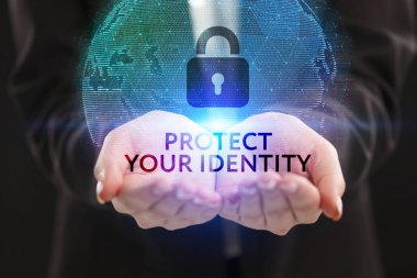 İş, teknoloji, Internet ve ağ kavramı. Geleceğin sanal bir ekranda çalışan genç bir girişimci ve yazıt görür: Kimliğinizi korumak