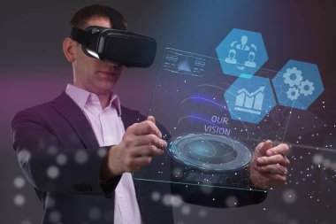 İş, teknoloji, Internet ve ağ kavramı. Geleceğin sanal bir ekranda çalışan genç bir girişimci ve yazıt görür: Vizyonumuz