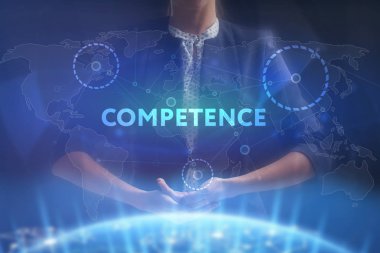 İş, teknoloji, Internet ve ağ kavramı. Geleceğin sanal bir ekranda çalışan genç bir girişimci ve yazıt görür: yeterlilik