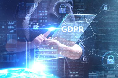 İş, teknoloji, Internet ve ağ kavramı. Geleceğin sanal bir ekranda çalışan genç bir girişimci ve yazıt görür: Gdpr