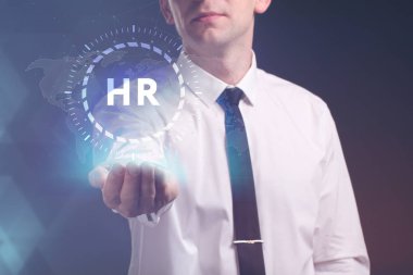 İş, teknoloji, Internet ve ağ kavramı. Geleceğin sanal bir ekranda çalışan genç bir girişimci ve yazıt görür: Hr