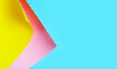 Soyut yaratıcı renkli kağıt arka plan. Mavi, pembe ve sarı renkler.