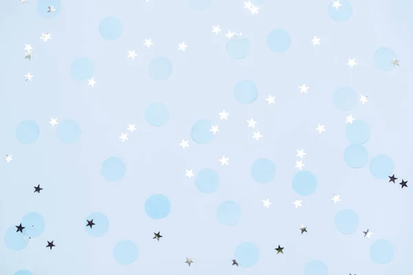 Blauwe feestelijke confetti, glitter en sterren — Stockfoto