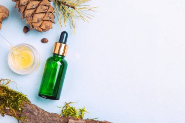 Homeopatik yağlar, bağırsak sağlığı doğal kozmetik, hafif bir arka plan üzerinde cilt bakımı için yağlar için diyet takviyeleri.