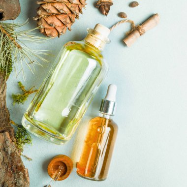 Homeopatik yağlar, bağırsak sağlığı doğal kozmetik, hafif bir arka plan üzerinde cilt bakımı için yağlar için diyet takviyeleri.