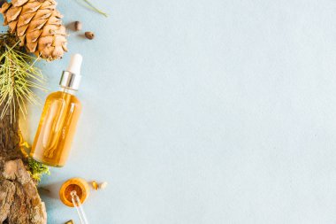 Homeopatik yağlar, bağırsak sağlığı doğal kozmetik, hafif bir arka plan üzerinde cilt bakımı için yağlar için diyet takviyeleri.