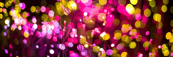 Sfondo astratto con fantasia bokeh texture viola al neon e colore dorato. Sfondo di Natale alla moda . — Foto Stock